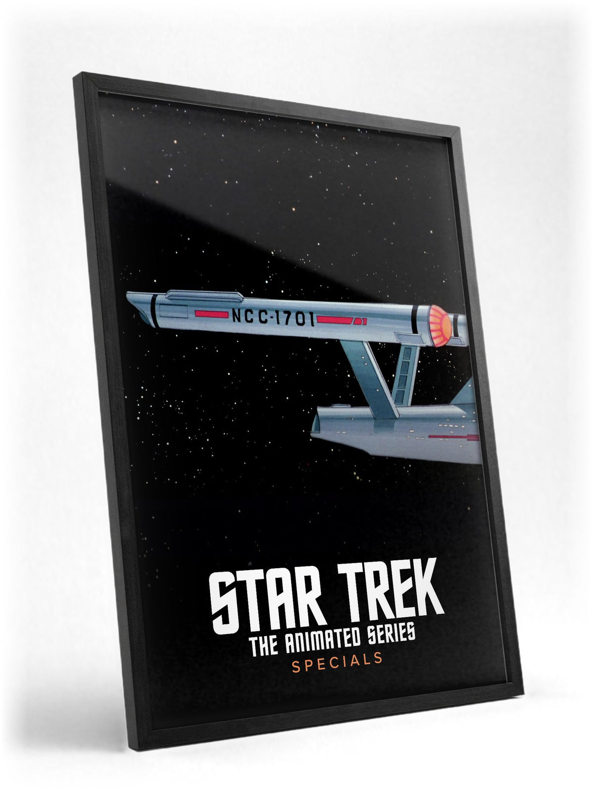 Star Trek: The Animated Series poster in a black frame with glass leaning against a wall