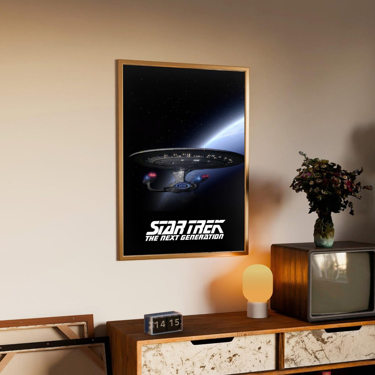 Star Trek: The Next Generation poster in an oak frame above a sideboard