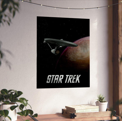 Star Trek: The Original Series poster unframed on a white wall above a desk