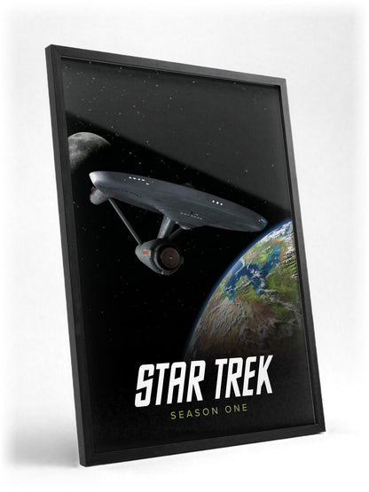 Star Trek: The Original Series poster in a black frame with glass leaning against a wall