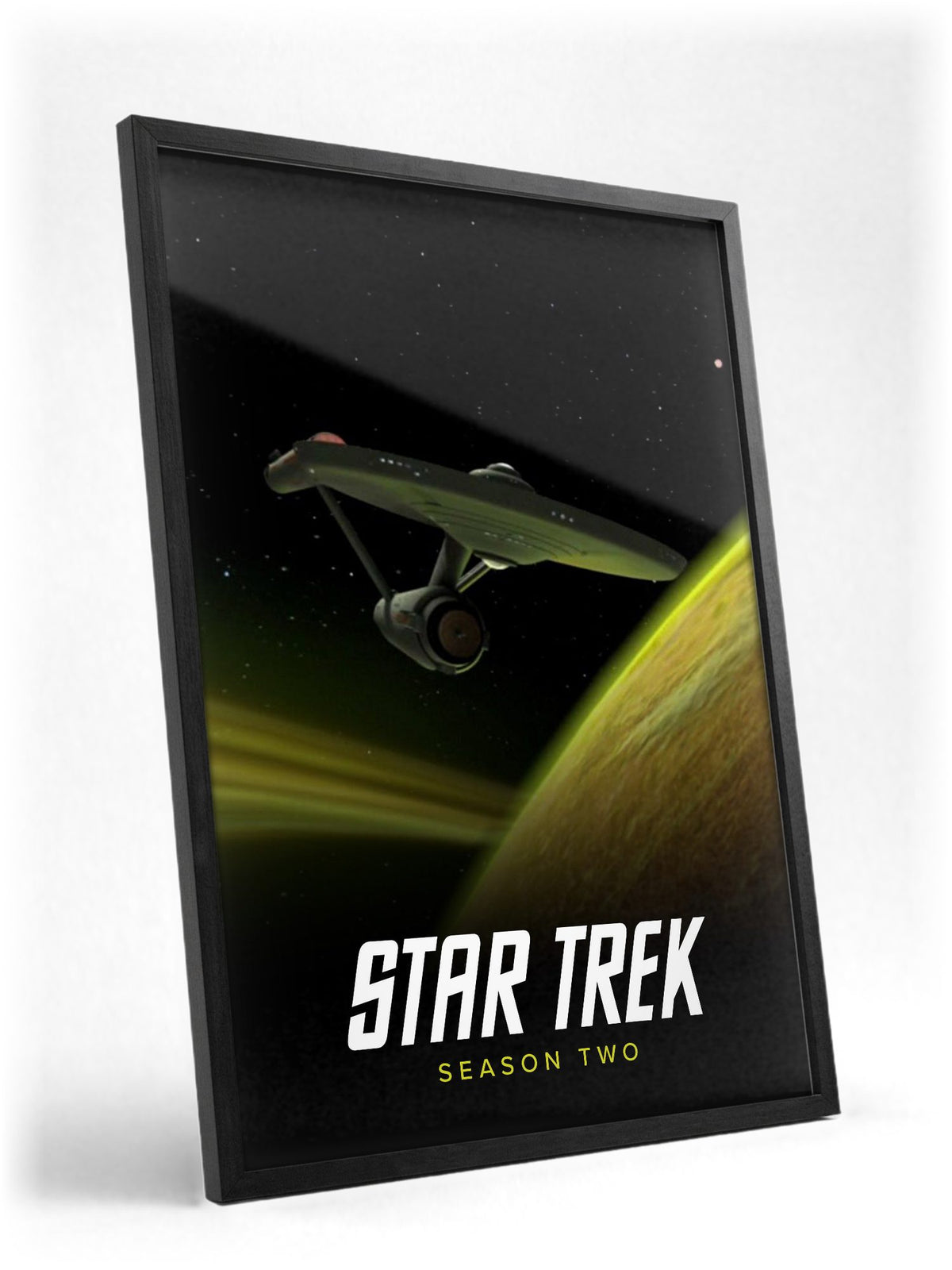 Star Trek: The Original Series poster in a black frame with glass leaning against a wall