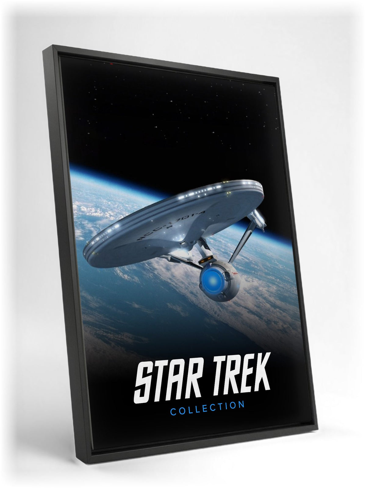 Star Trek TV Collection Art as a black floater framed canvas leaning against a wall