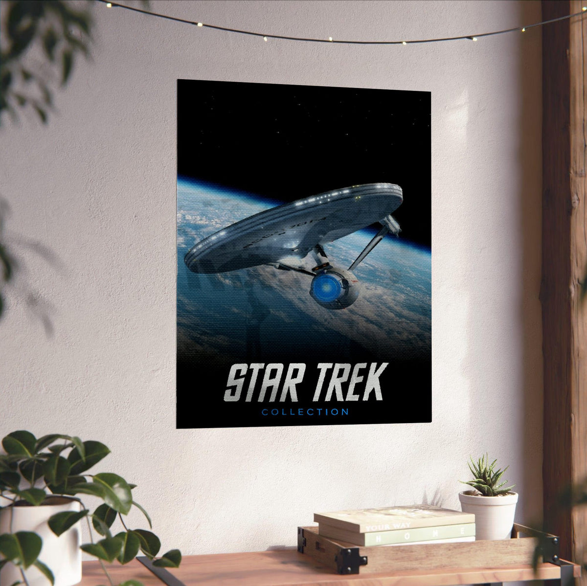 Star Trek TV Collection Art poster unframed on a white wall above a desk