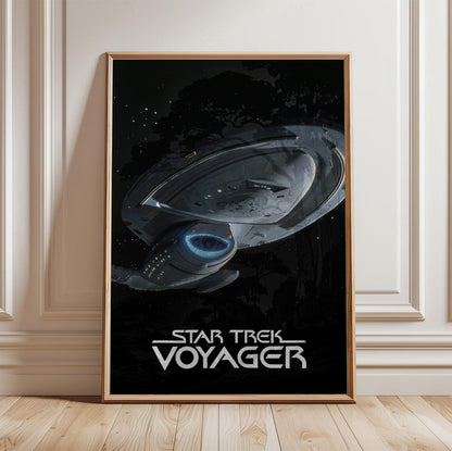Star Trek: Voyager poster in a light oak frame leaning against a white wall