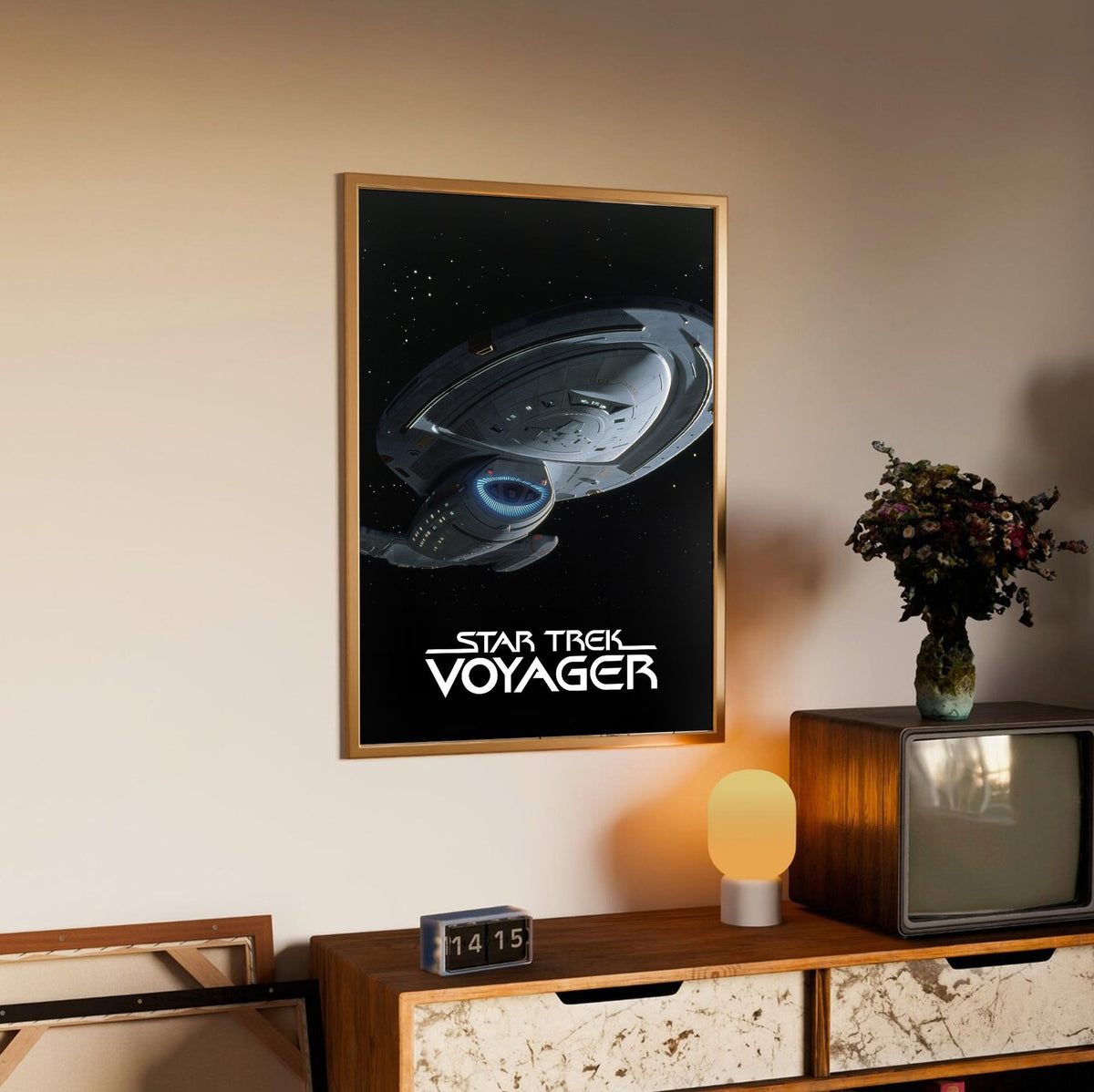 Star Trek: Voyager poster in an oak frame above a sideboard