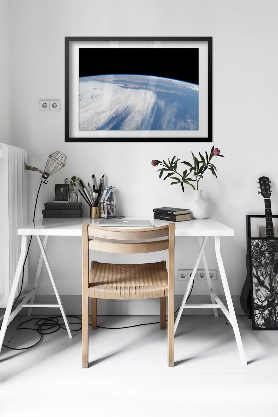 STS-125 view of Earth from Space Shuttle Atlantis poster framed in a bright home office
