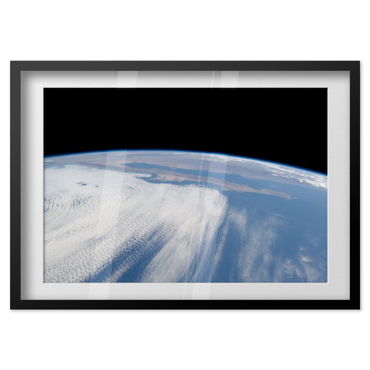 STS-125 view of Earth from Space Shuttle Atlantis poster in a black frame