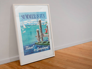 Summer is Fun Greyhound poster in a white frame leaning against a wall