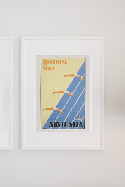 Sunshine and Surf Australia poster on a light wall