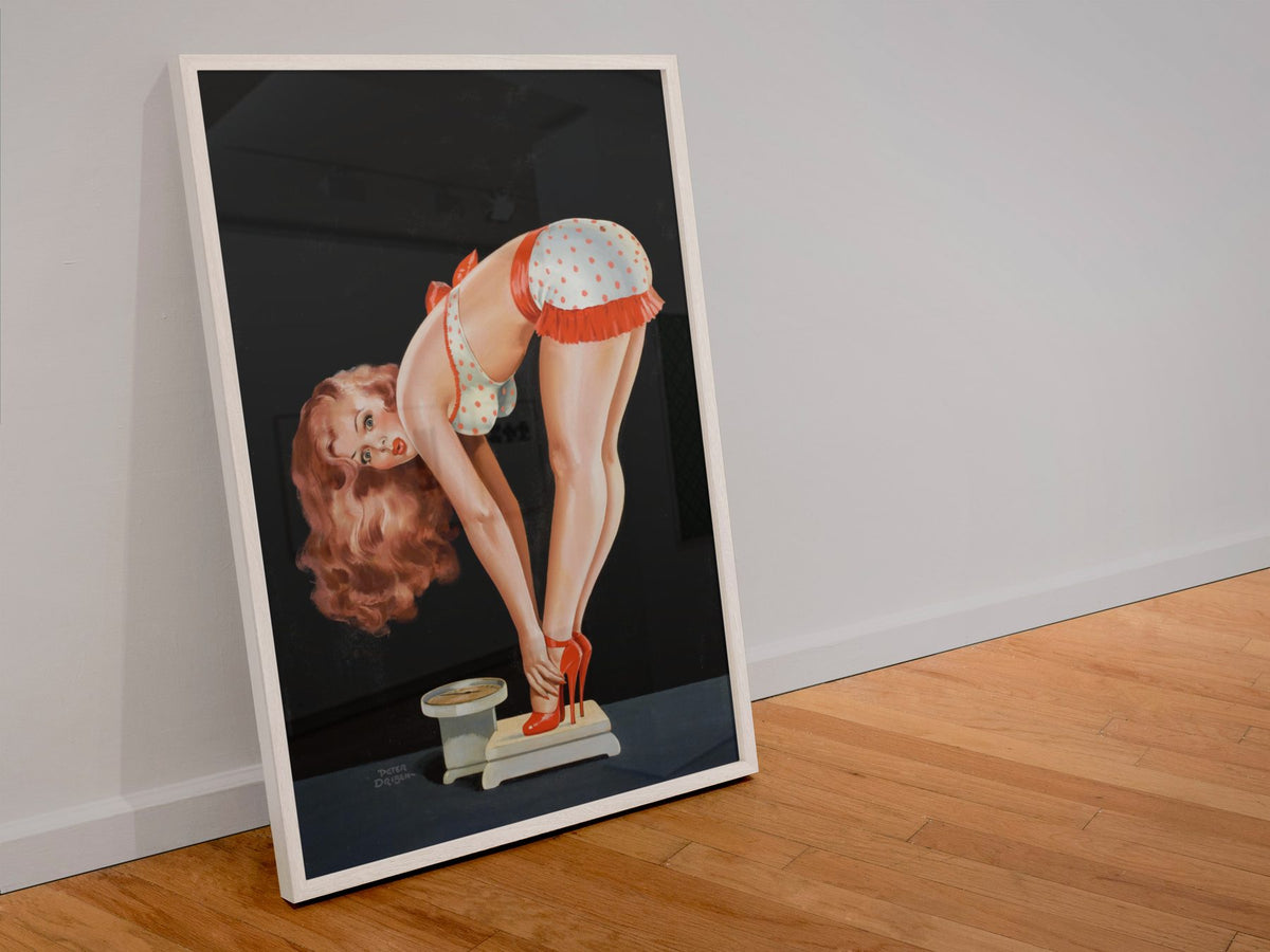 Surprise poster in a white frame leaning against a wall