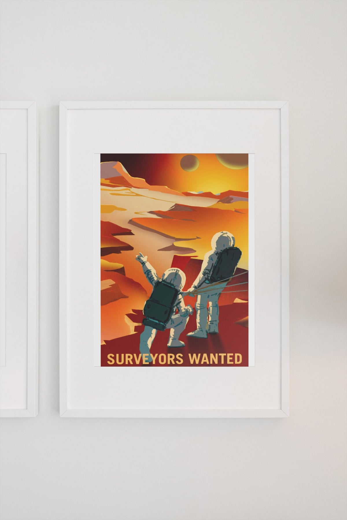 Surveyors Wanted on Mars poster in a white frame on a light wall