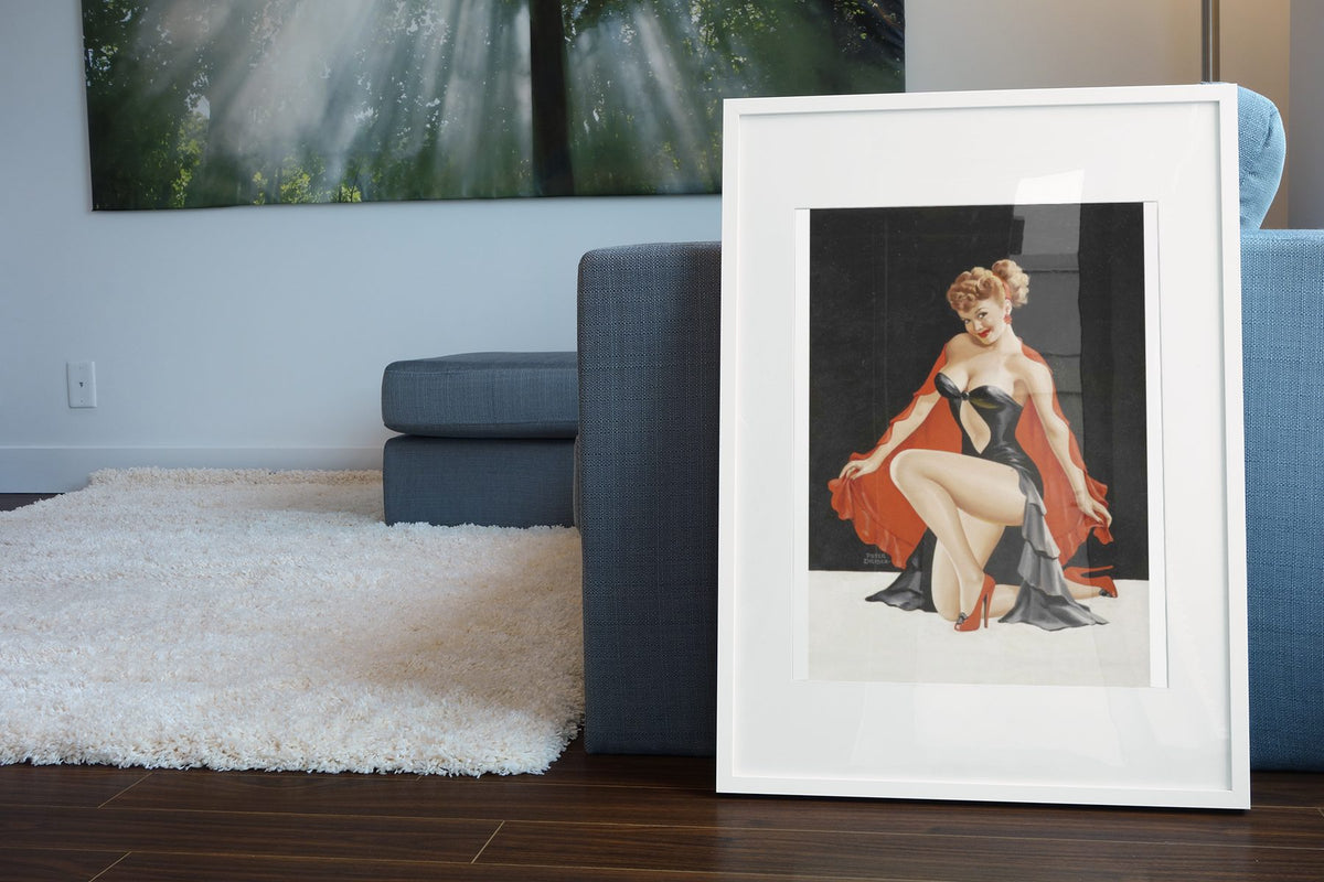 Sweet and Sultry poster leaning beside a blue sofa