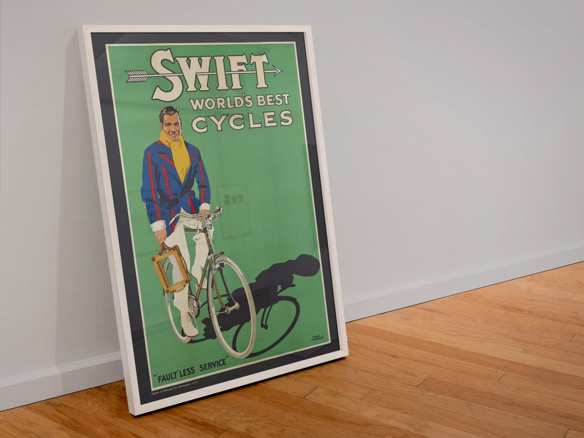 Swift Worlds Best Cycles poster in a white frame leaning against a wall