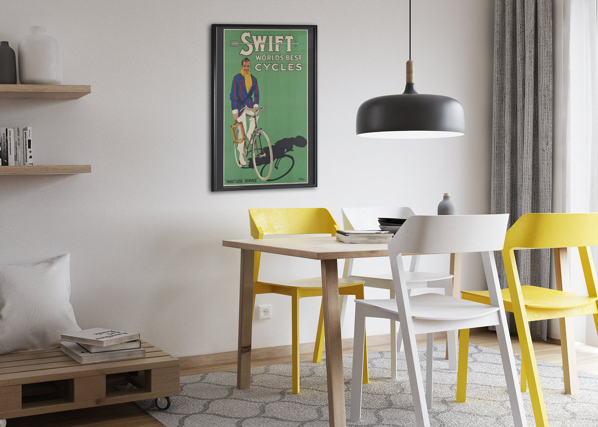 Swift Worlds Best Cycles poster framed above a dining table
