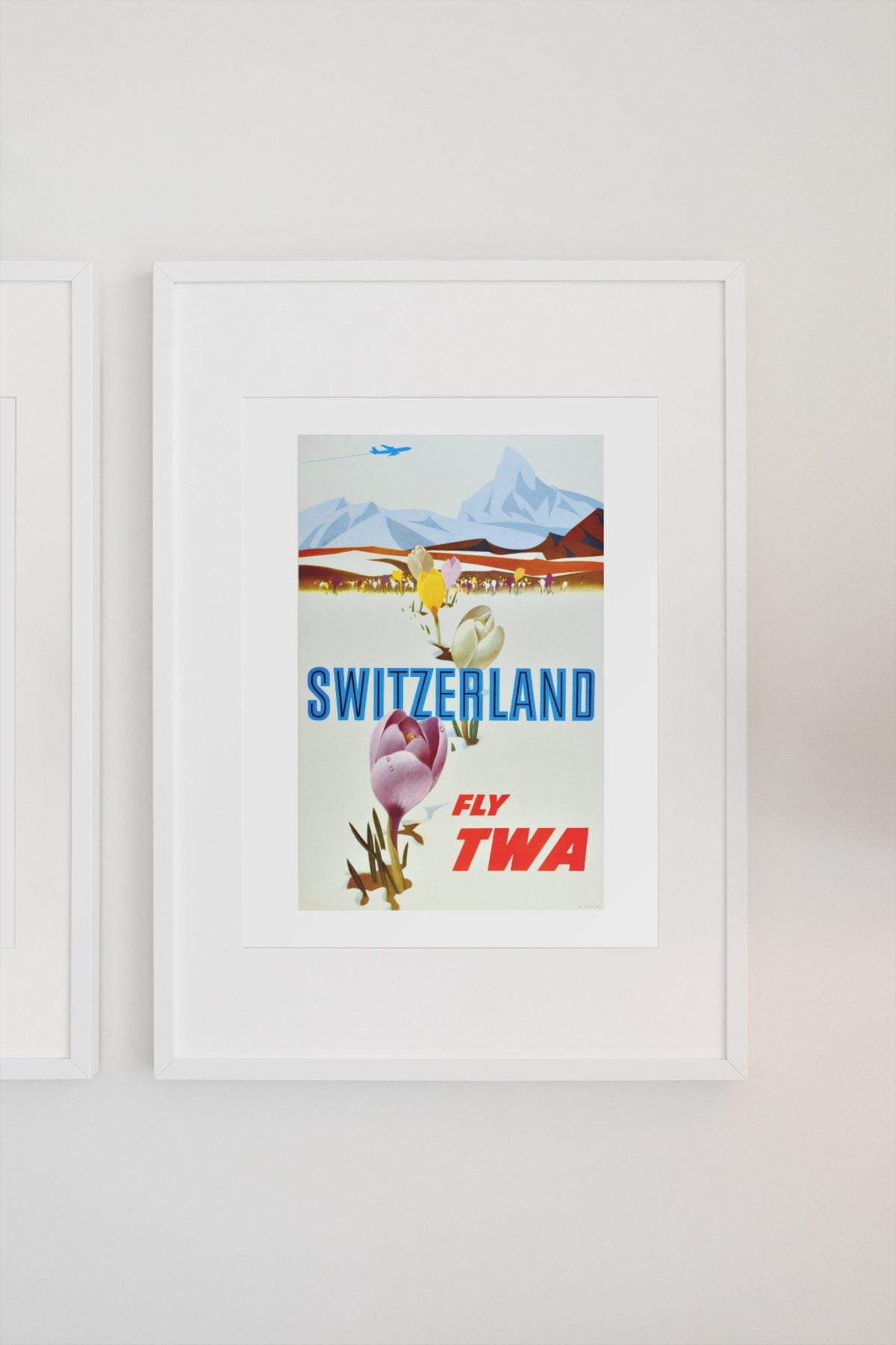 Switzerland Fly TWA poster on a light wall