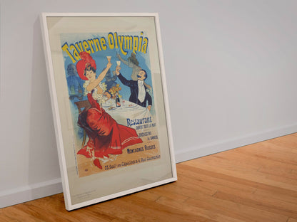 Taverne Olympia 1900 poster in a white frame leaning against a wall