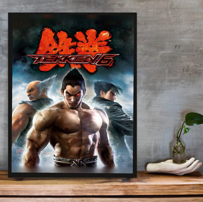 Tekken 6 Promo Art Print 2 poster in a black frame on a wooden shelf against concrete