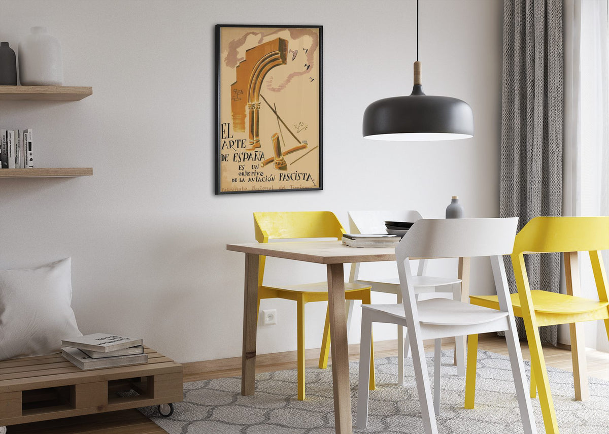 The Art of Spain Is a Target poster framed above a dining table