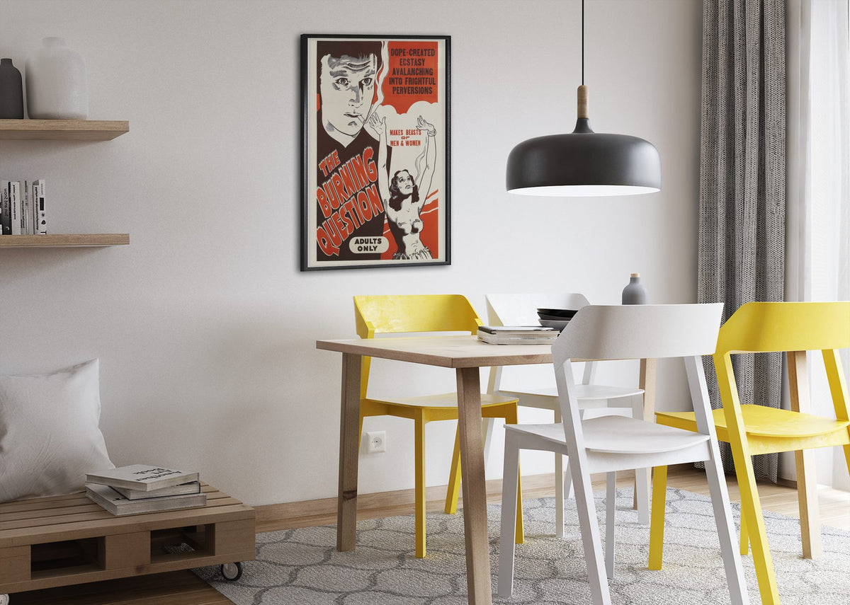The Burning Question poster framed above a dining table