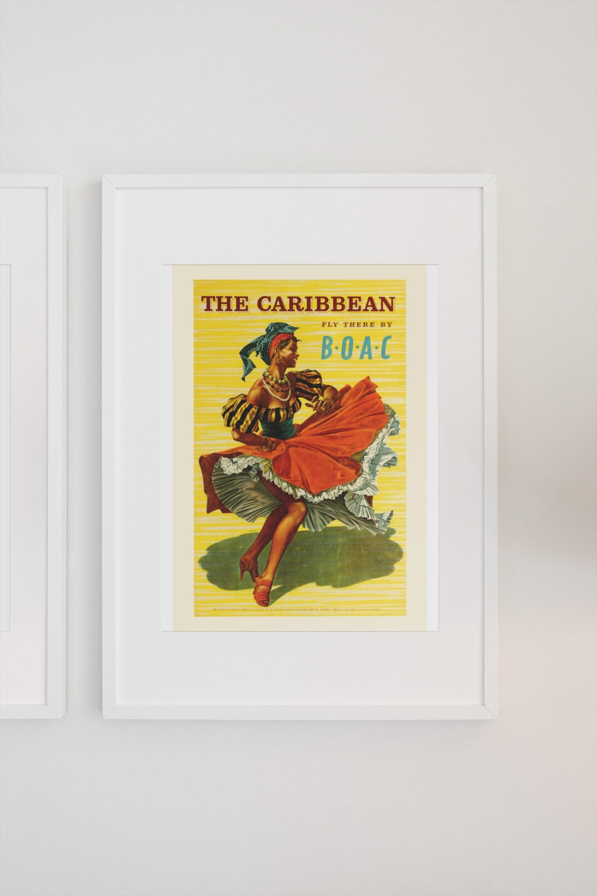 The Caribbean BOAC poster on a light wall