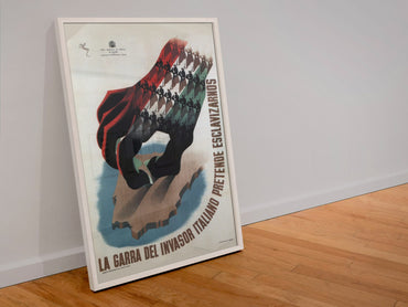 The Claw La Garra poster in a white frame leaning against a wall