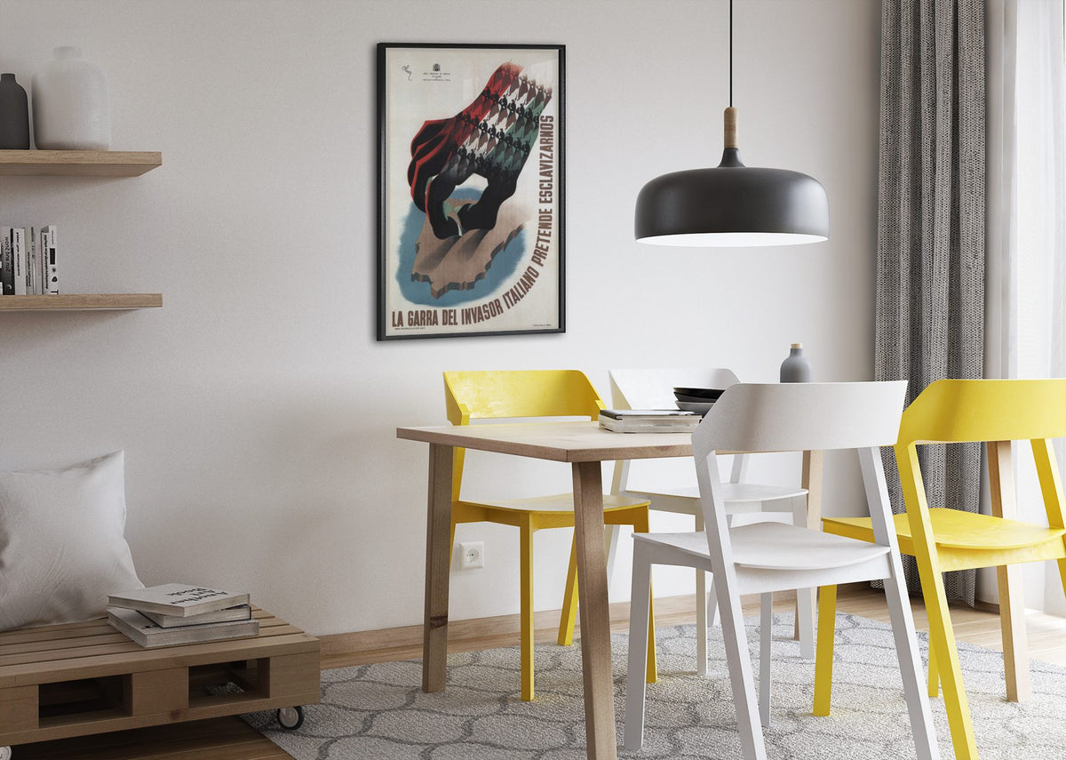 The Claw La Garra poster framed above a dining table