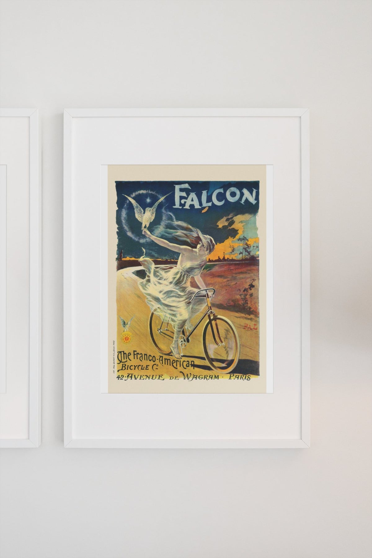 The Falcon Bicycle poster on a light wall