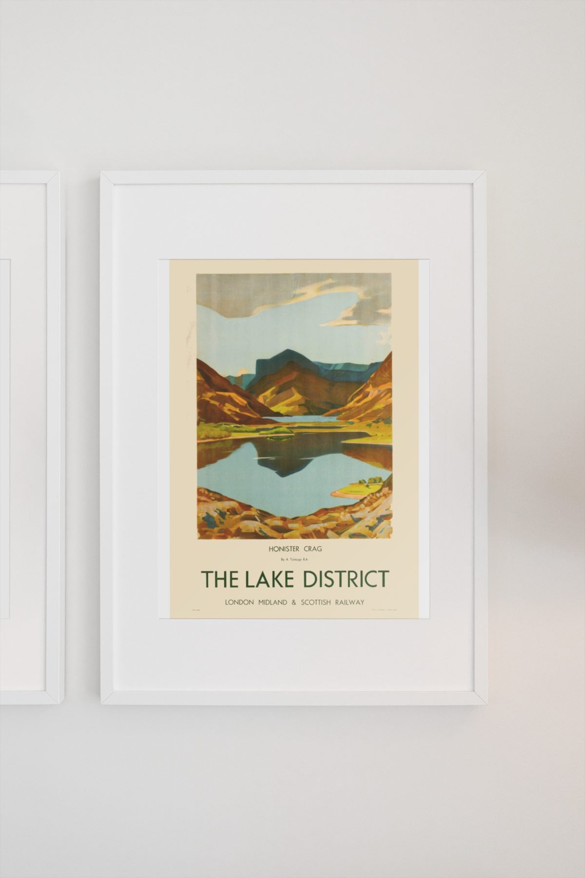 The Lake District poster on a light wall