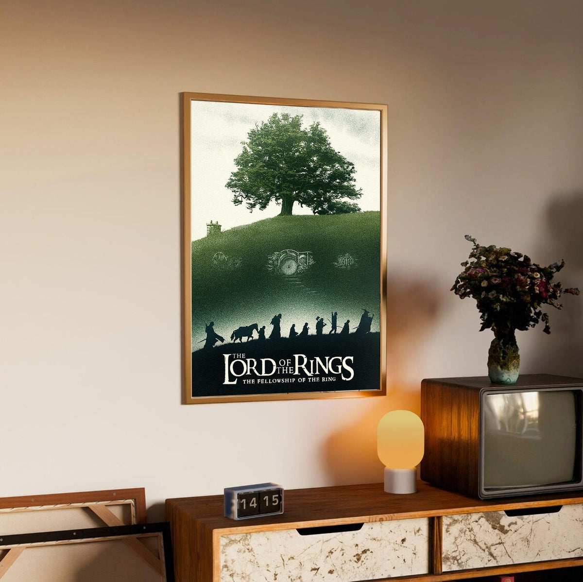 The Lord of the Rings: The Fellowship of the Ring (2001) Shire Tree Art poster in an oak frame above a sideboard