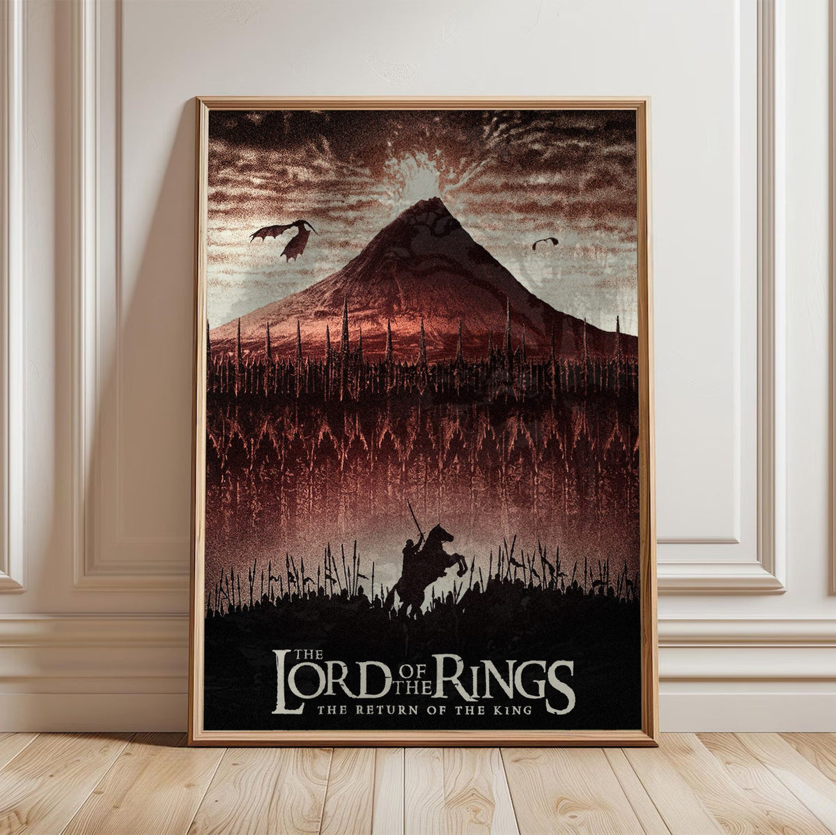 The Lord of the Rings: The Return of the King (2003) Mount Doom Art poster in a light oak frame leaning against a white wall