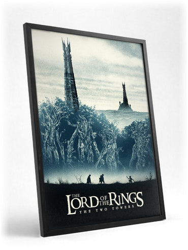 The Lord of the Rings: The Two Towers (2002) Movie Two Towers Art poster in a black frame with glass leaning against a wall