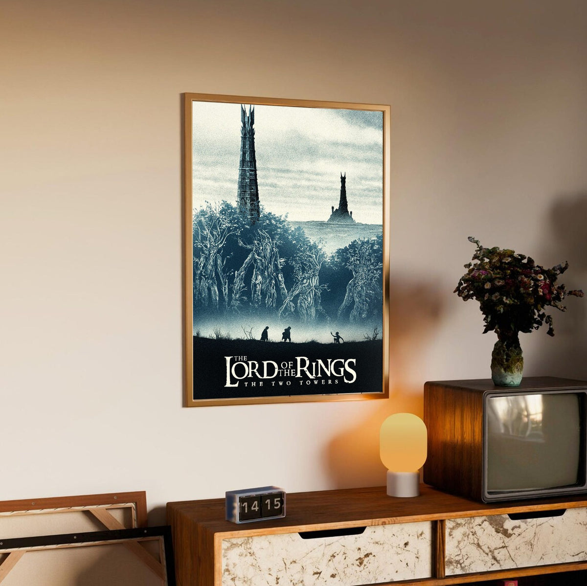 The Lord of the Rings: The Two Towers (2002) Movie Two Towers Art poster in an oak frame above a sideboard