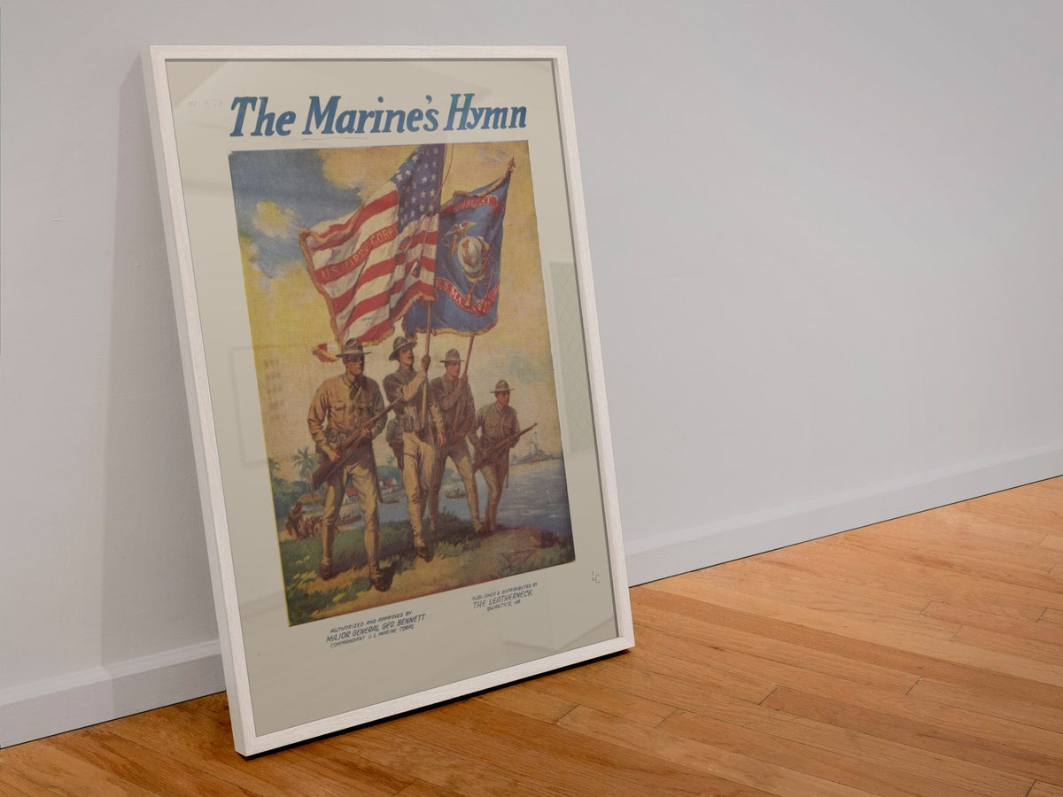 The Marines Hymn poster in a white frame leaning against a wall