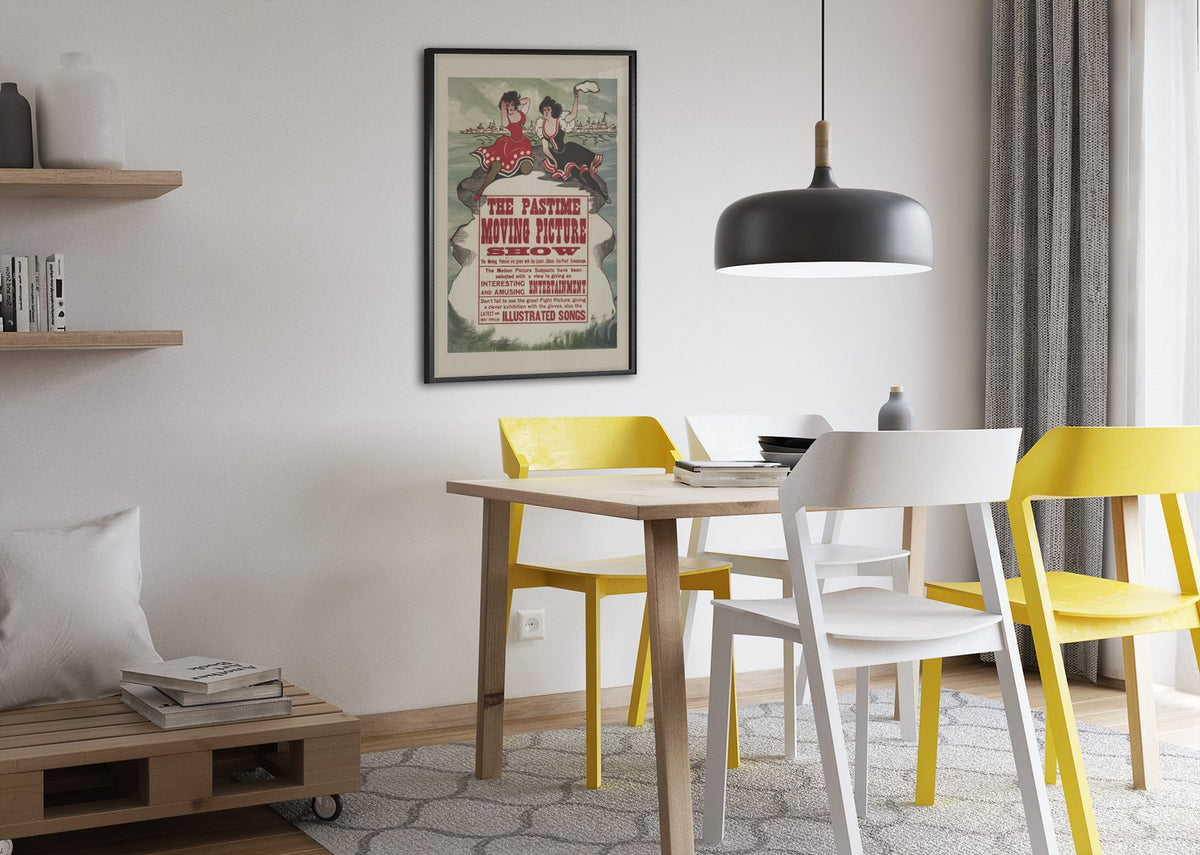 The Pastime Moving Picture Show poster framed above a dining table