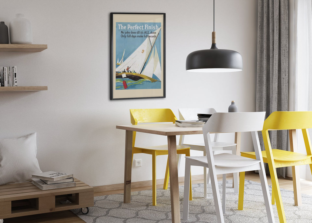The Perfect Finish poster framed above a dining table