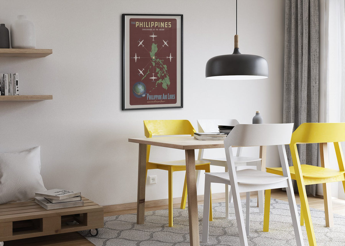 Philippines Crossroads of the Orient poster framed above a dining table