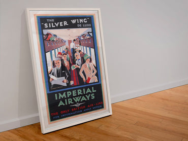 Silver Wing Imperial Airways poster in a white frame leaning against a wall