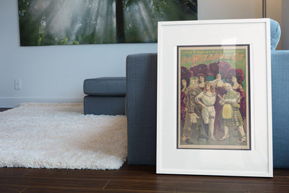 The Wizard of Oz Stage Musical poster leaning beside a blue sofa