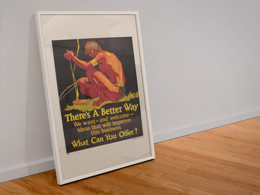 There’s a Better Way poster in a white frame leaning against a wall