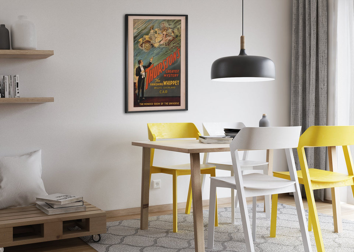 Thurston Vanishing Whippet Car poster framed above a dining table
