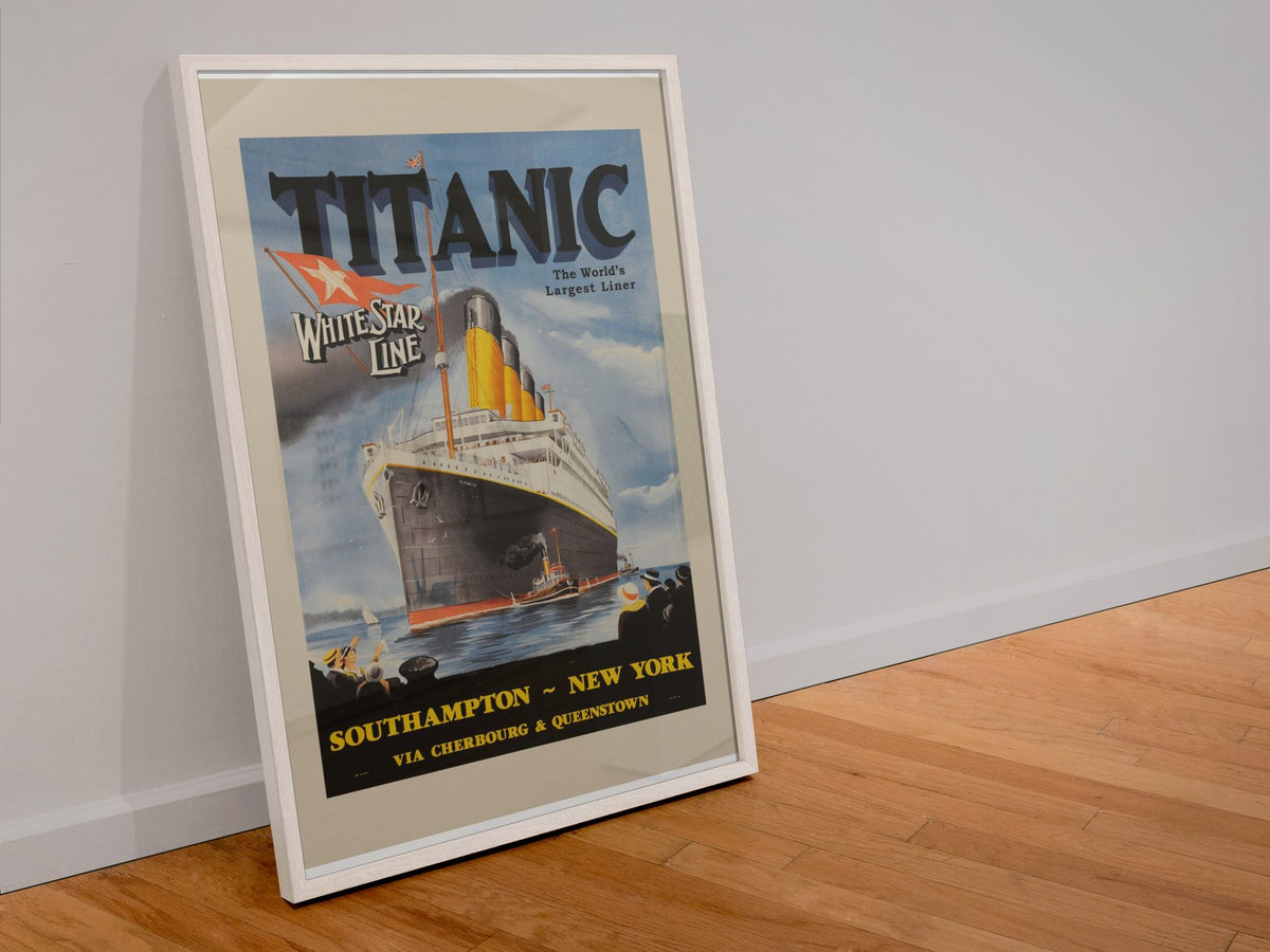 Titanic White Star Line poster in a white frame leaning against a wall