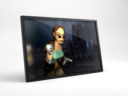 Tomb Raider III Key Art poster in a black frame with glass leaning against a wall