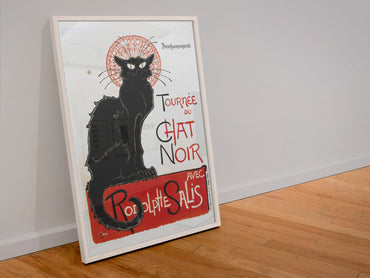 Tournée du Chat Noir 1896 black cat poster in a white frame leaning against a wall