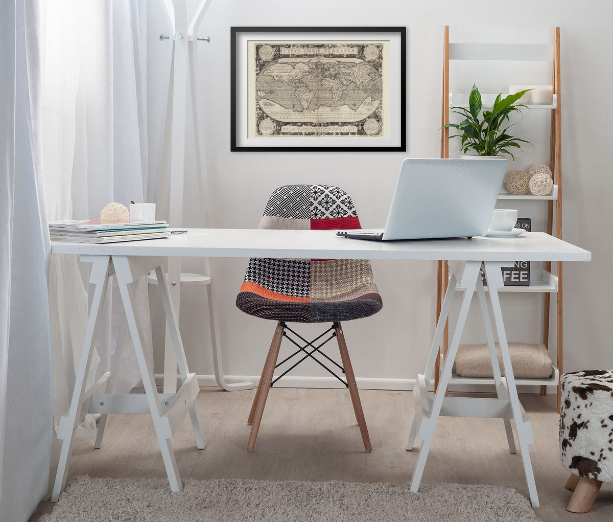 Typus Orbis Terrarum 1608 framed above a white desk in a home office