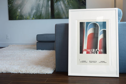 United States Lines Funnels poster leaning beside a blue sofa