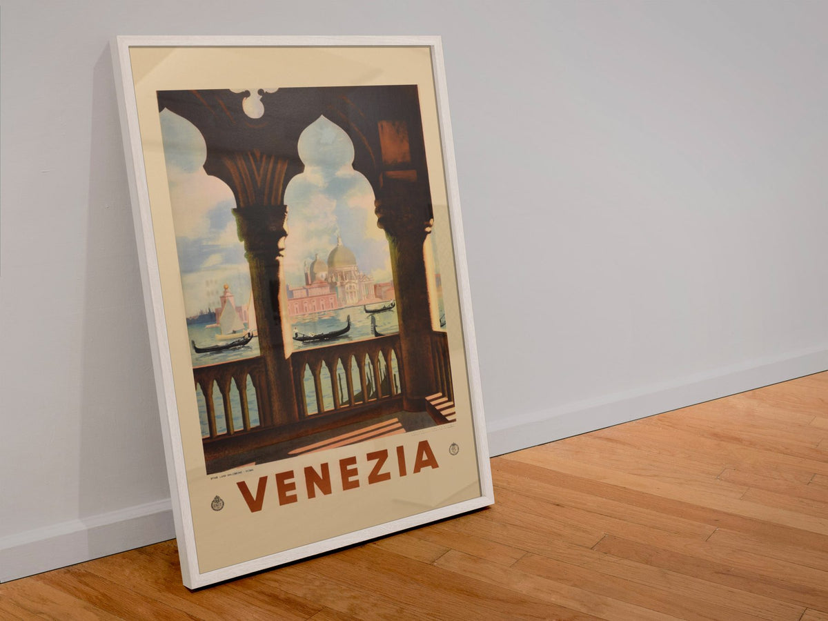 Venezia St Marks Basilica poster in a white frame leaning against a wall