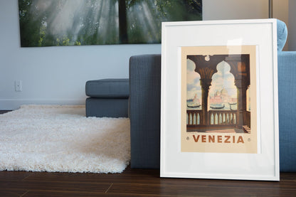 Venezia St Marks Basilica poster leaning beside a blue sofa