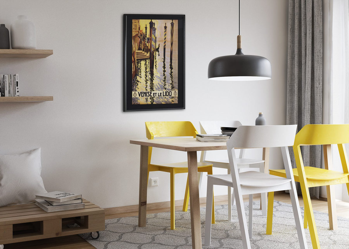 Venise et le Lido poster framed above a dining table