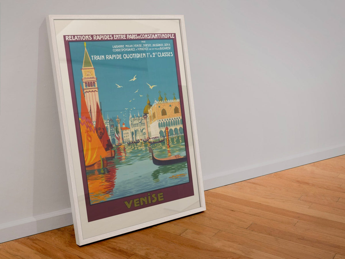 Venise Paris to Constantinople Express poster in a white frame leaning against a wall