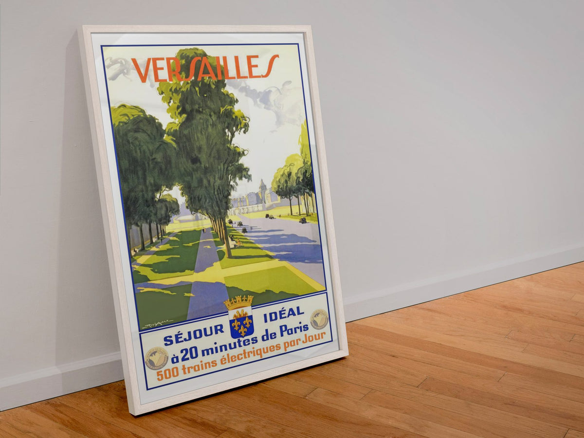 Versailles Sejour Ideal poster in a white frame leaning against a wall
